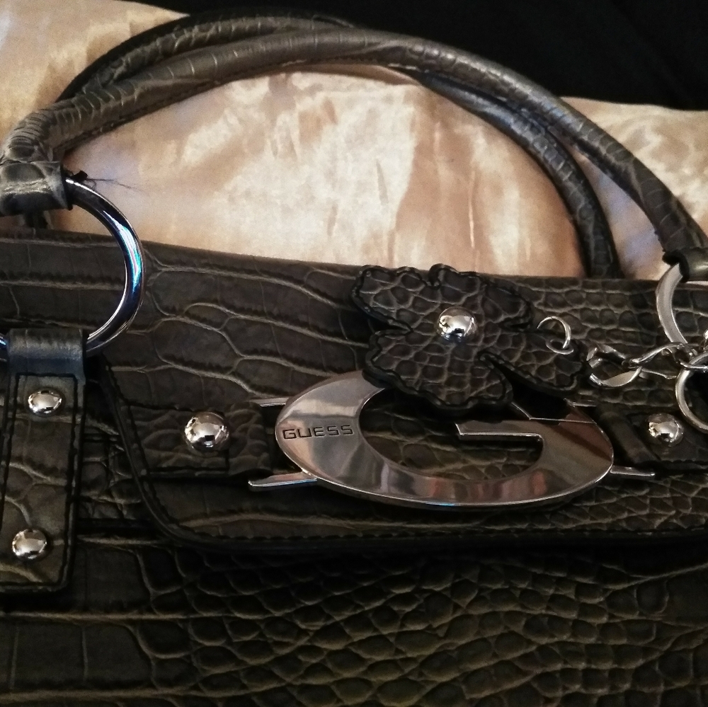 Metallic green Guess purse